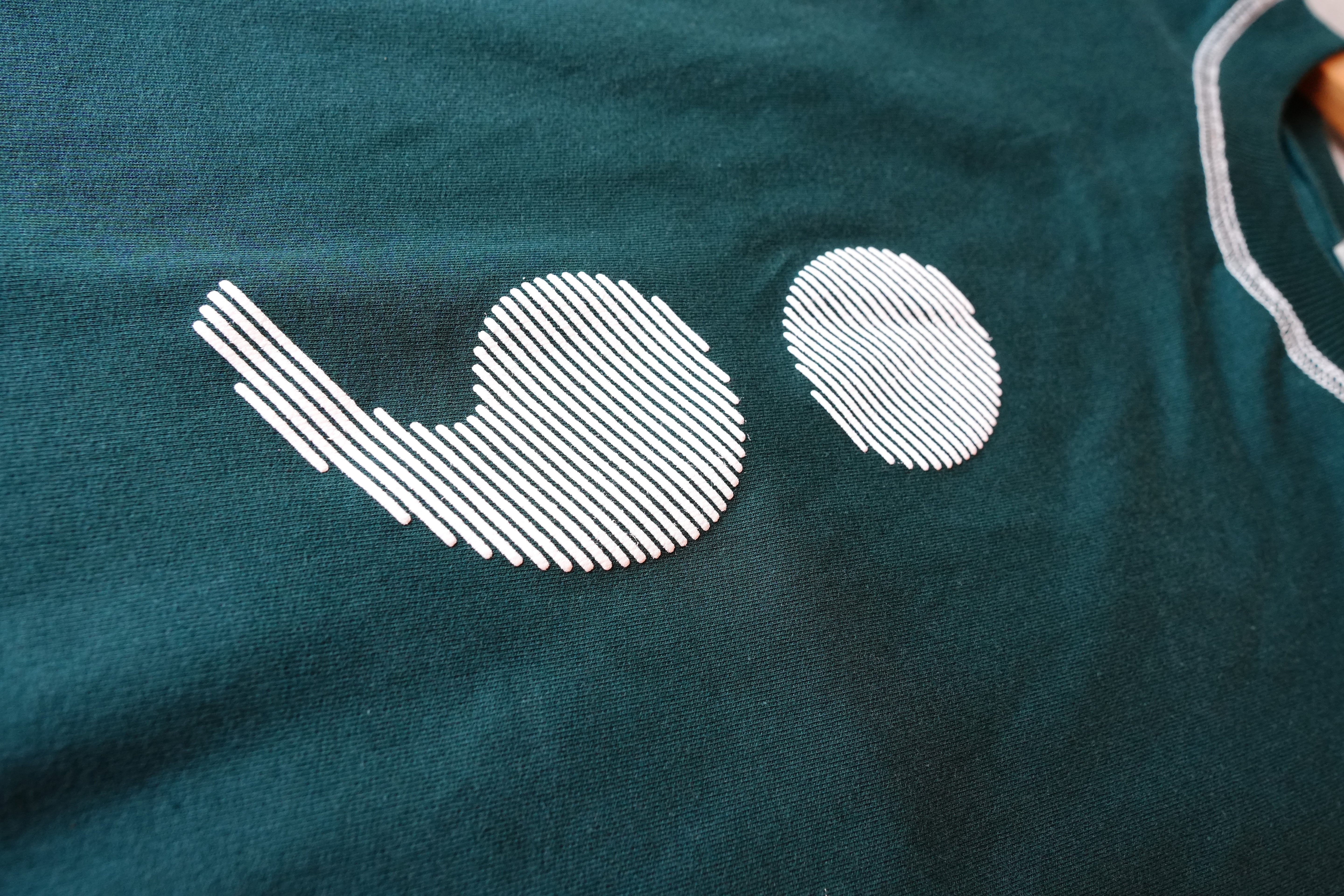 Continuation (embossed print TShirt)