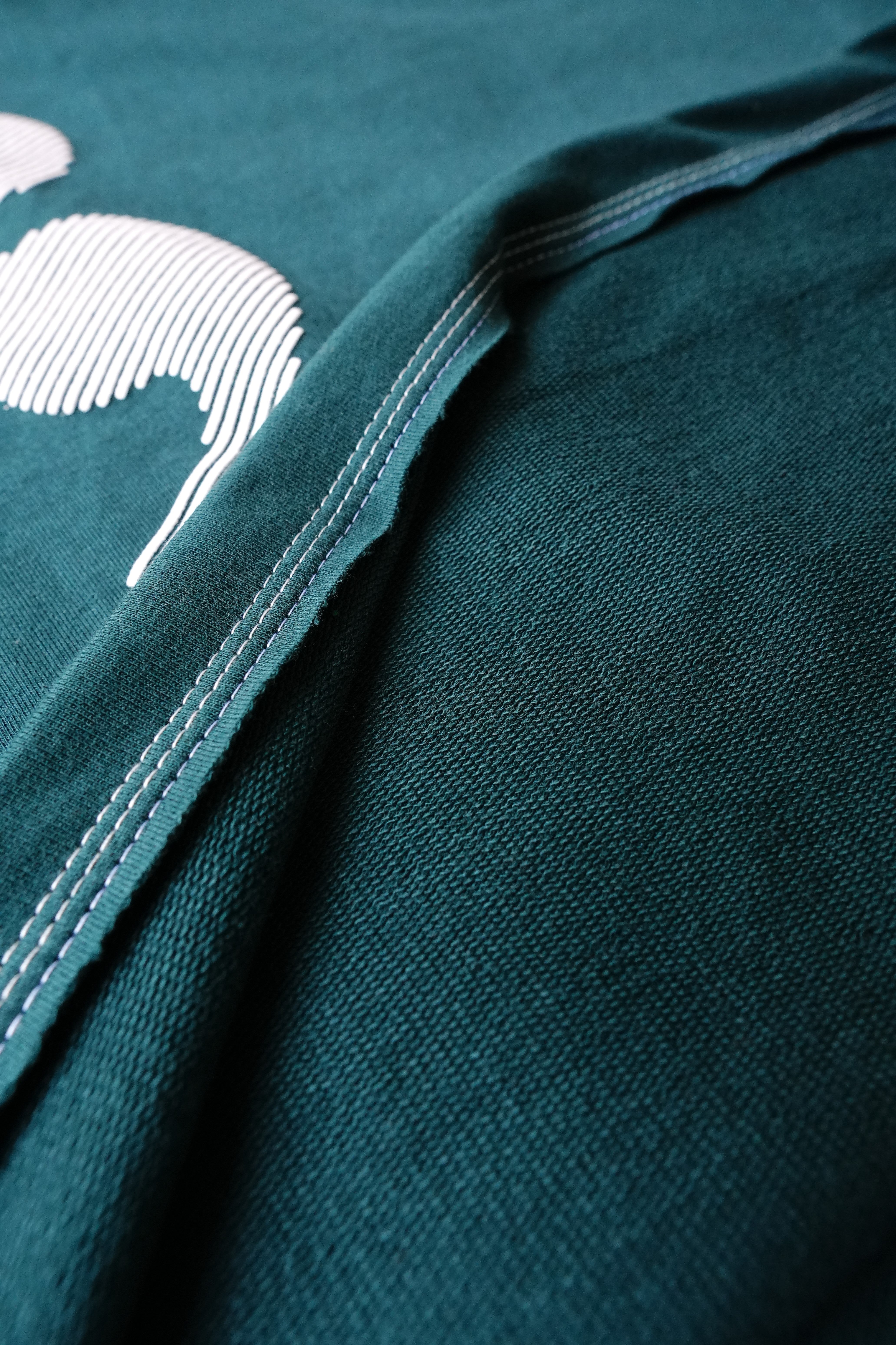 Continuation (embossed print TShirt)